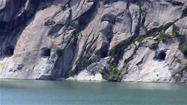Man-made holes in the rockface opposite Tyssedal on Sørfjord, 5.3 miles into the ride